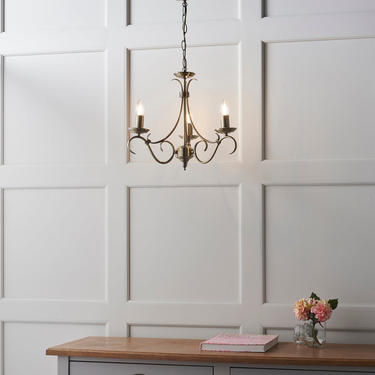 Bernice three light antique brass pendant styled view