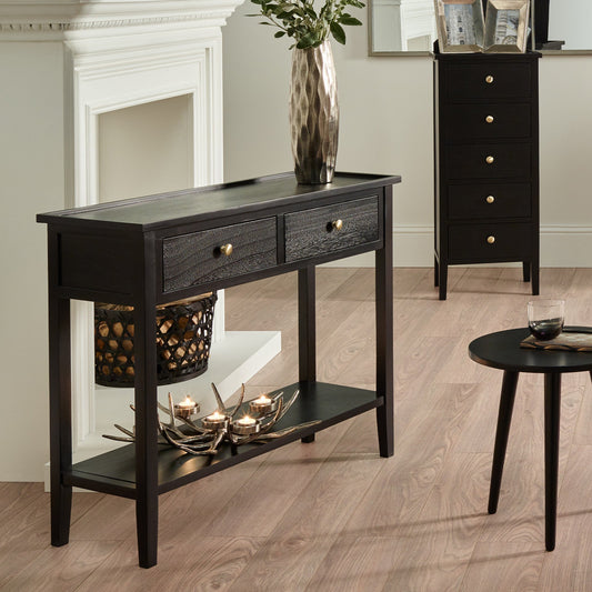 Chelmsford satin black console table styled in a contemporary interior