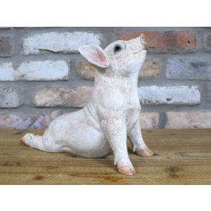 Stretching pig resin ornament