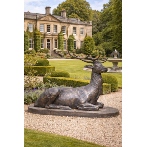 Large laying stag statue