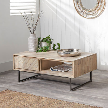 Marca sand wash acacia coffee table styled in a contemporary living room