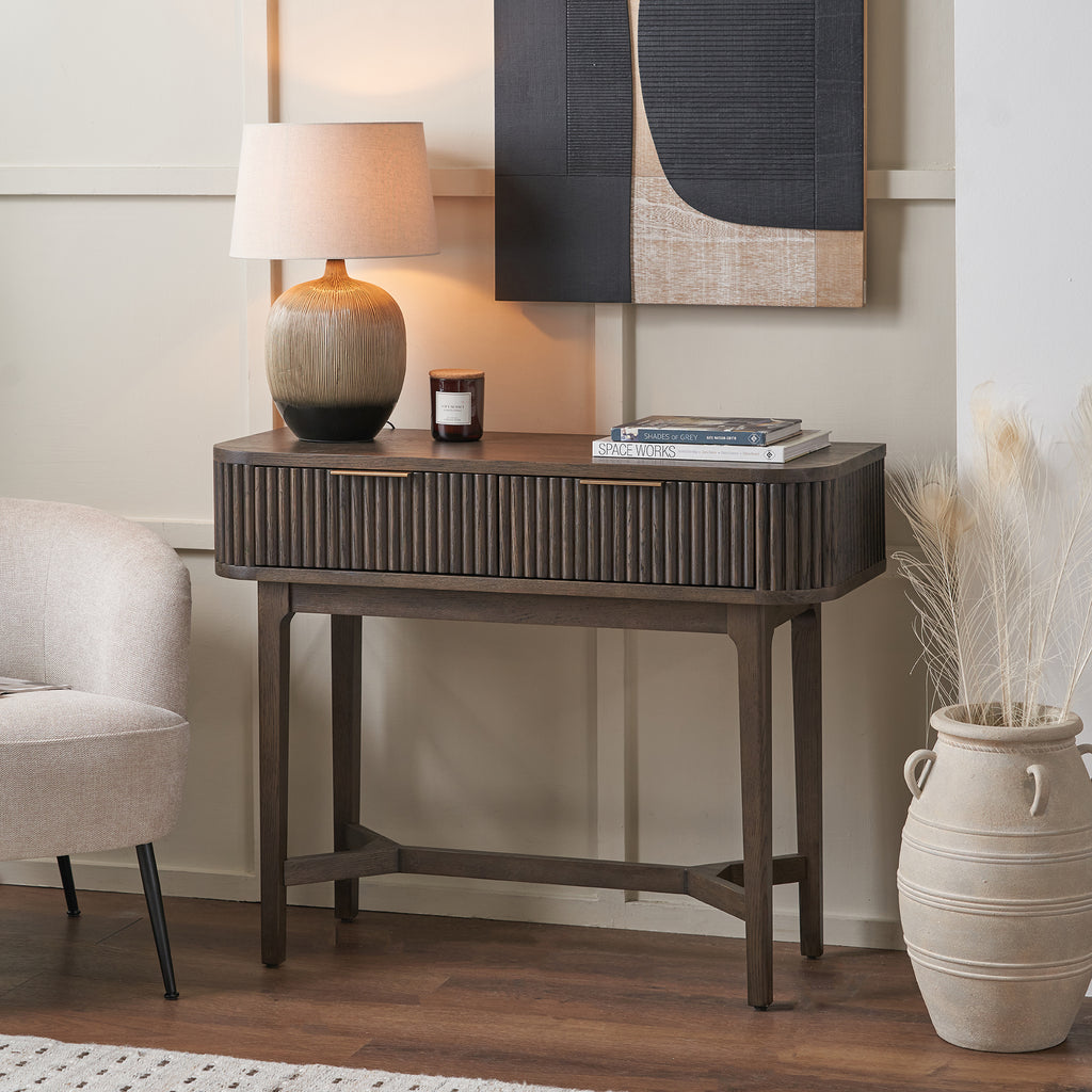 Raie dark brown ribbed console table styled in a contemporary interior