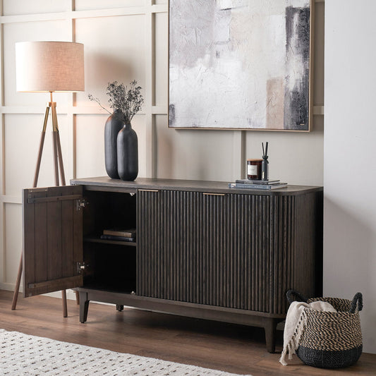Raie dark brown ribbed three door sideboard styled in a contemporary interior