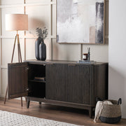 Raie dark brown ribbed three door sideboard styled in a contemporary interior