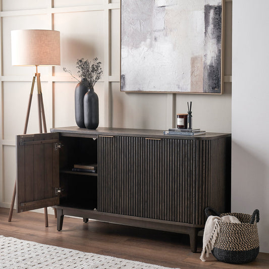 Raie dark brown ribbed three door sideboard styled in a contemporary interior