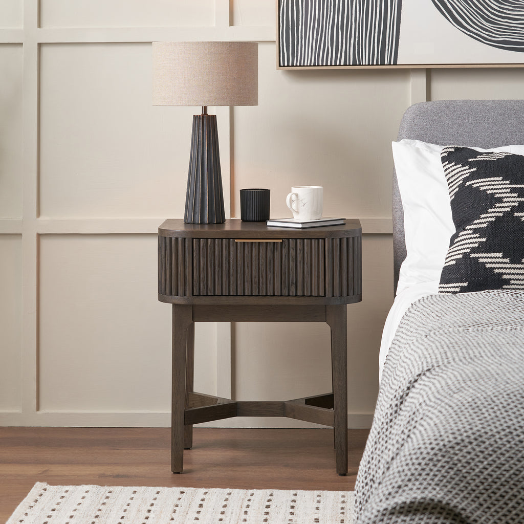 Raie dark brown ribbed one drawer unit styled beside a bed