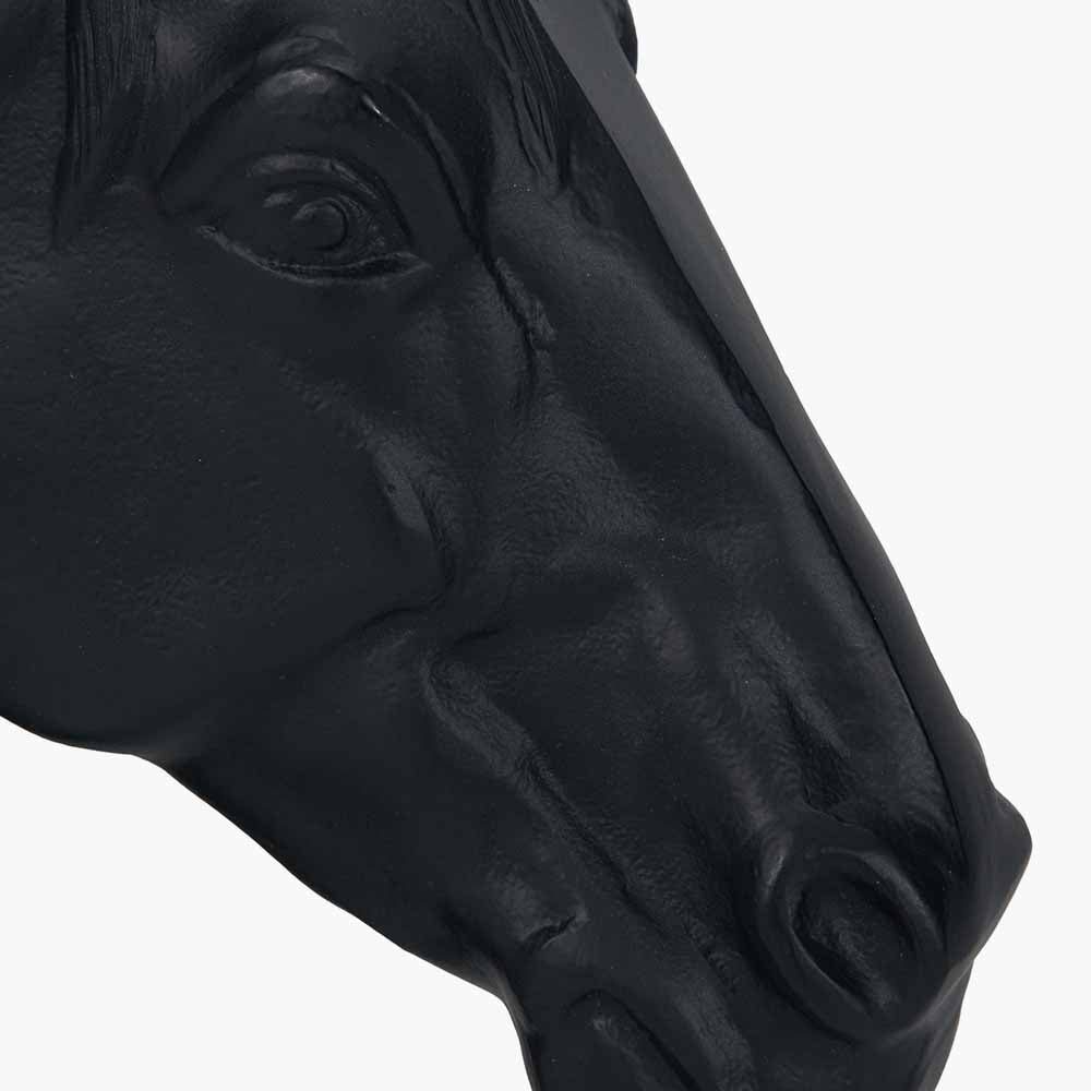 Black metal horse head ornament, facial detail